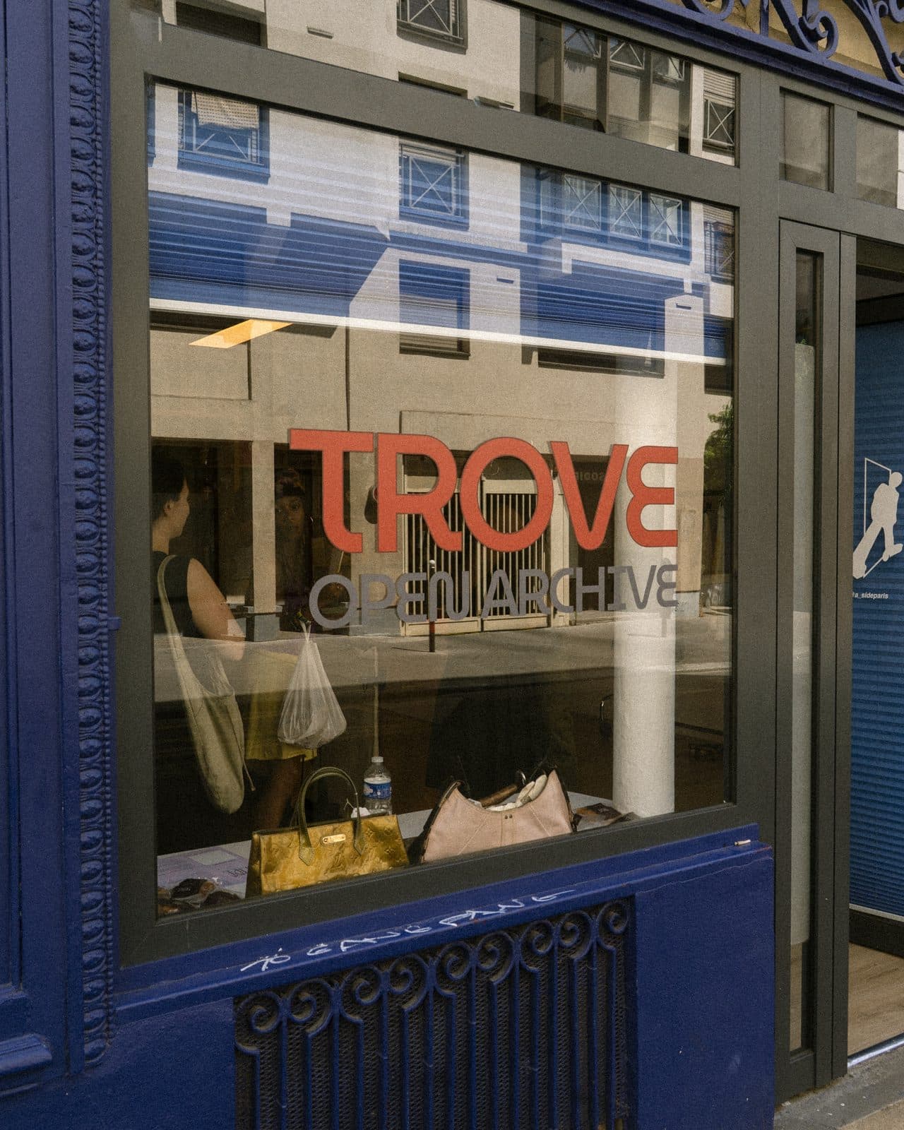 The Trove Open Archive shopfront on its blue frontage, seen from the street.